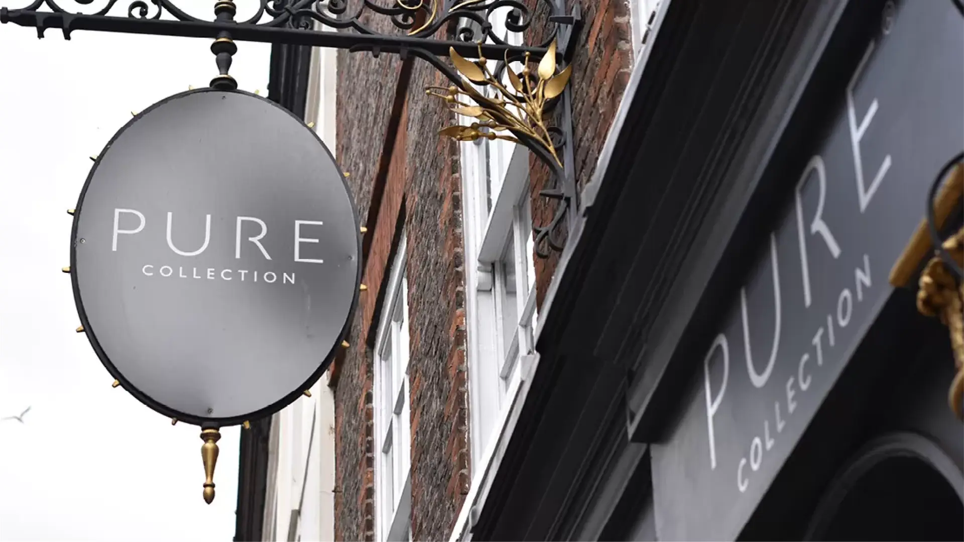 Illuminated pylon sign at night