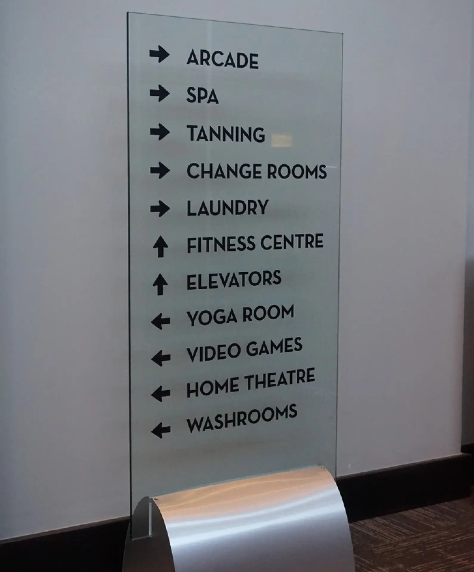 Directional signage in corridor