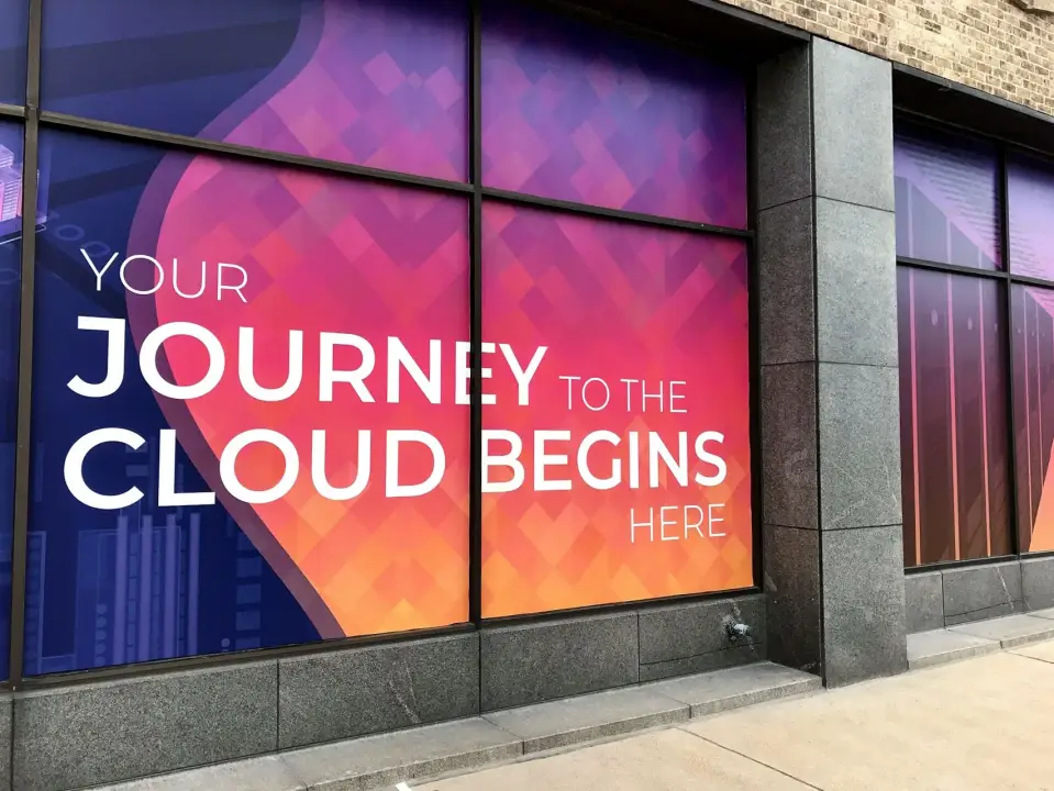 Perforated vinyl window wrap for storefront branding